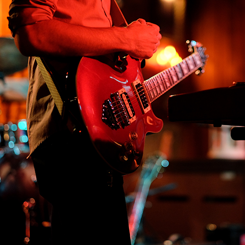 Bryan Elias Hull, standing with guitar, Velour 2015.
