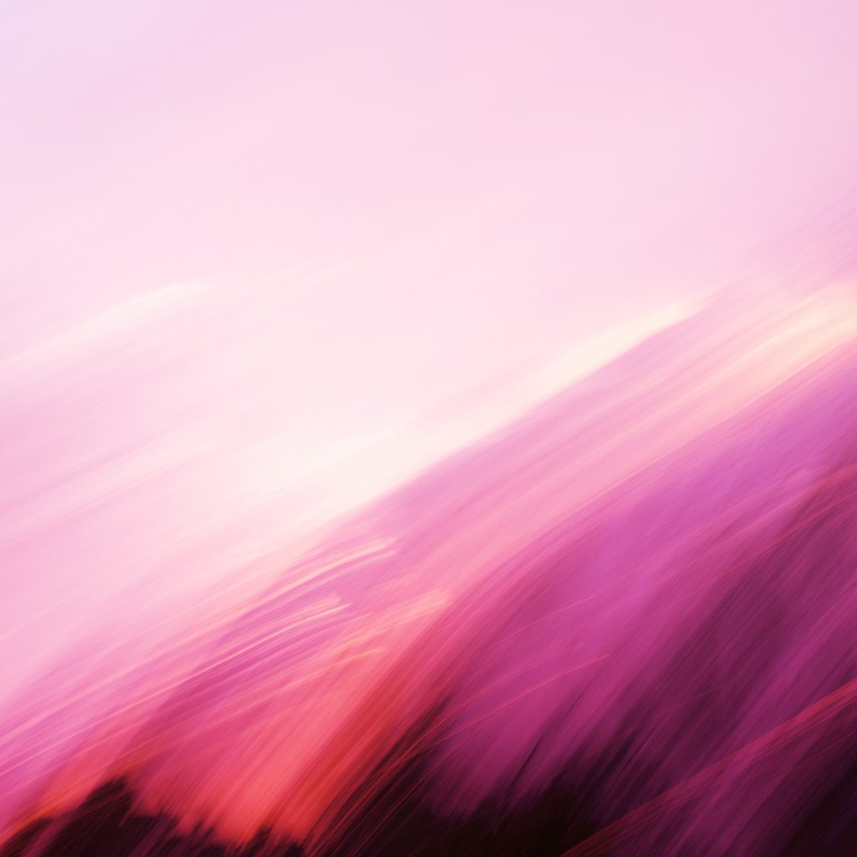 Album artwork featuring an abstract pink sunset with light streaks
